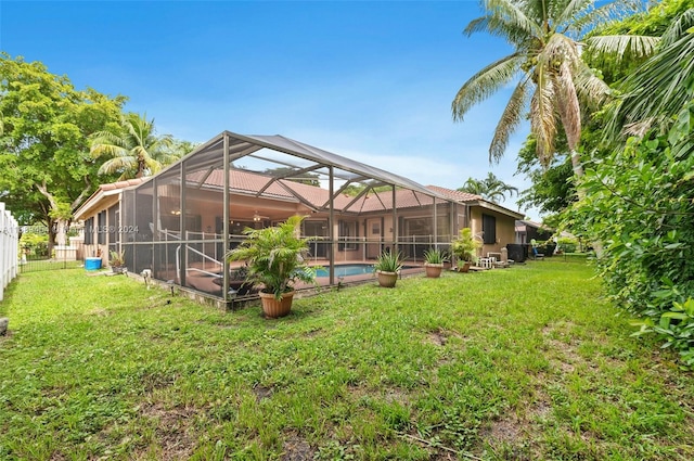 view of yard featuring glass enclosure