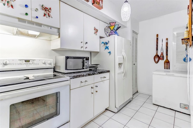 kitchen featuring pendant lighting, white appliances, light tile patterned floors, and white cabinets