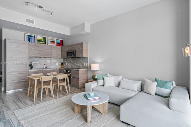 living room with light wood-type flooring