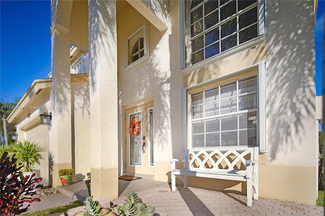 entrance to property with a patio area