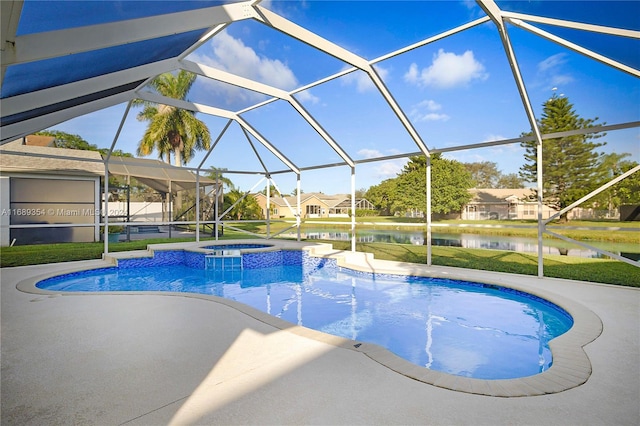 view of swimming pool with a patio, a lanai, an in ground hot tub, and a water view