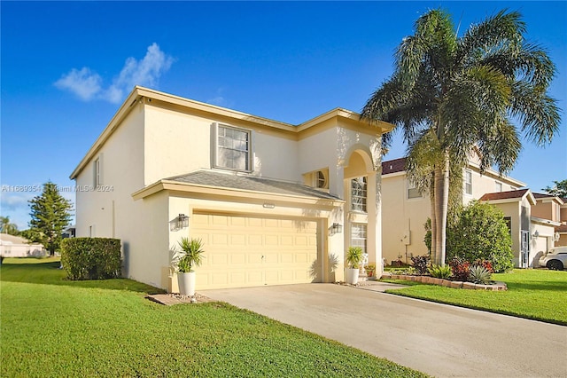 view of front of property featuring a garage and a front lawn