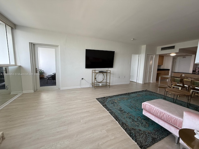 living room with light wood-type flooring