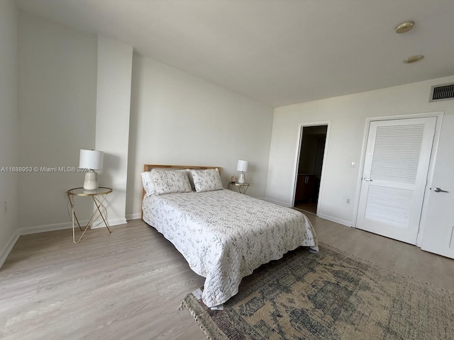 bedroom featuring light hardwood / wood-style floors