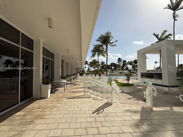 view of patio with a community pool