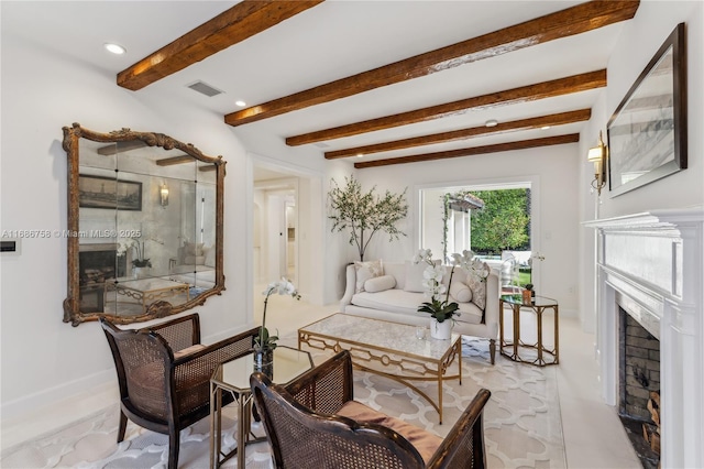 sitting room with beamed ceiling