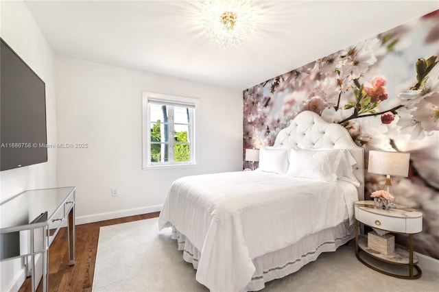 bedroom featuring wood-type flooring