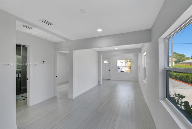 spare room with light wood-type flooring