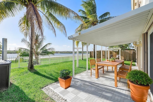 view of patio featuring a water view and central AC unit