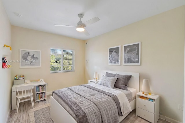 bedroom featuring ceiling fan and light hardwood / wood-style floors