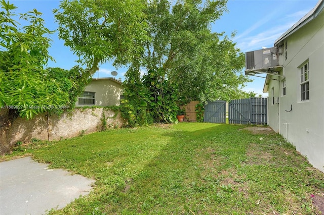 view of yard featuring central AC