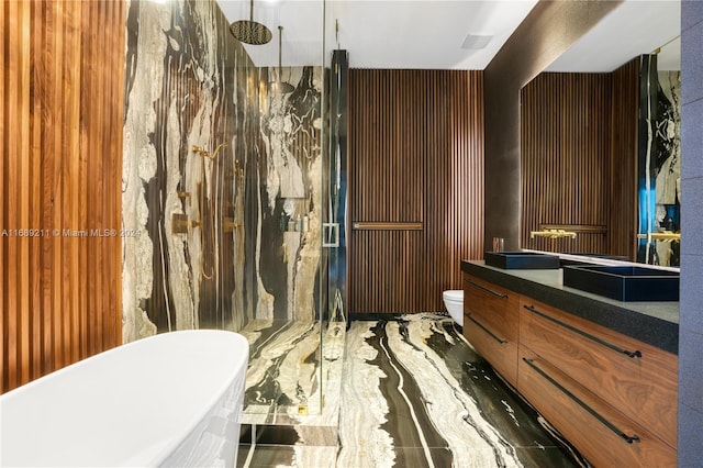 1451 Brickell Ave Ph 54, Miami, FL 33131 - full bathroom featuring a marble finish shower, vanity, a freestanding tub, and toilet