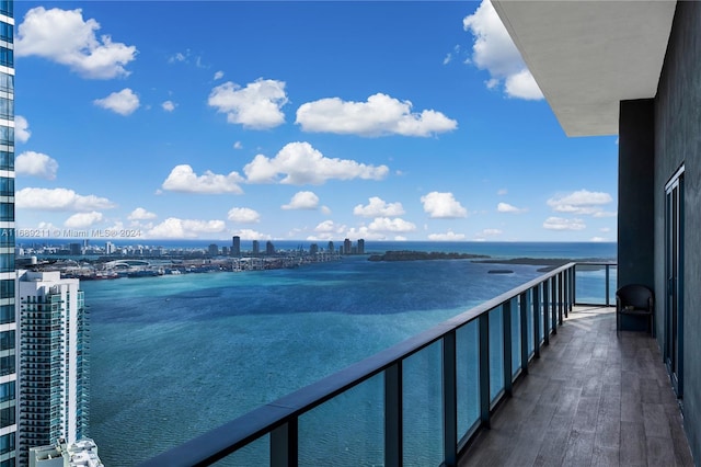 balcony featuring a water view