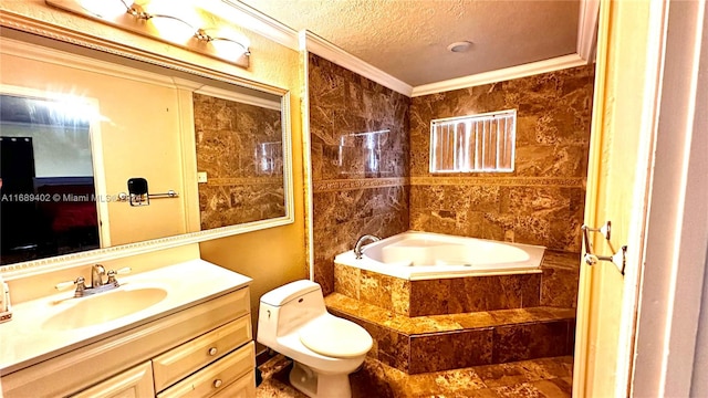 bathroom with toilet, a textured ceiling, tiled bath, ornamental molding, and vanity