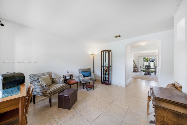 living area featuring light tile patterned floors