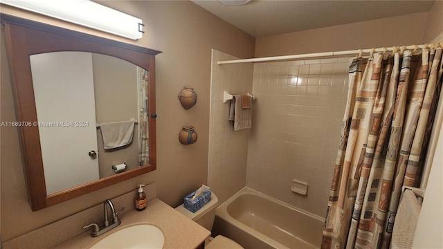 full bathroom with sink, toilet, and shower / tub combo