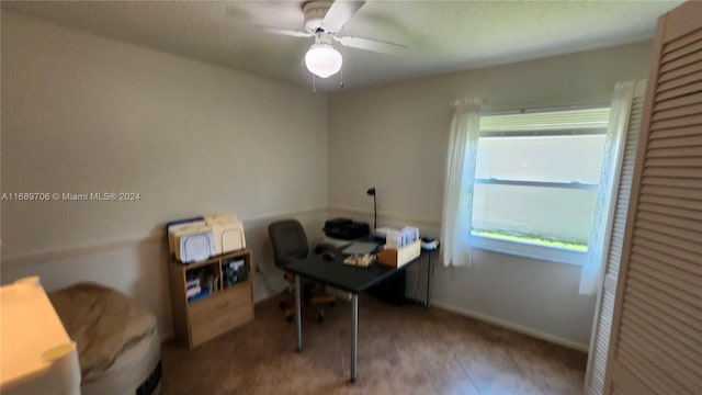 home office featuring ceiling fan and wood-type flooring