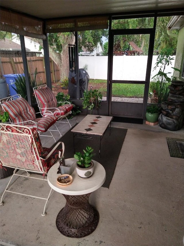 sunroom / solarium featuring plenty of natural light