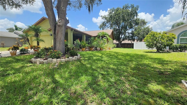 view of yard with a garage