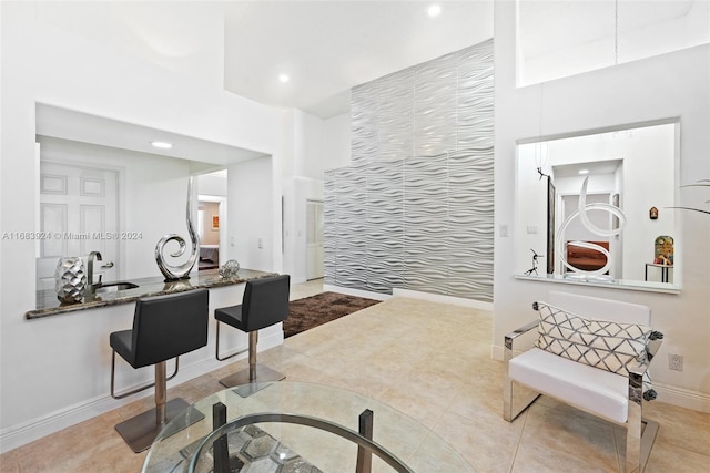 interior space with tile patterned flooring and sink