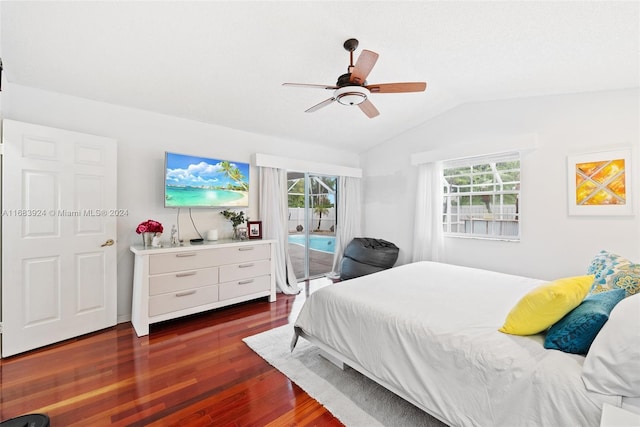 bedroom featuring vaulted ceiling, ceiling fan, multiple windows, and dark hardwood / wood-style flooring