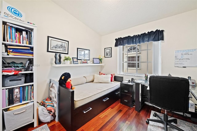 office space featuring dark hardwood / wood-style floors, a textured ceiling, and vaulted ceiling