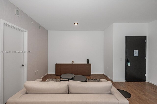 living room with wood-type flooring