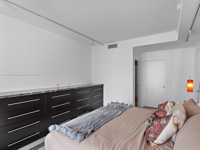 1900 N Bayshore Dr Unit 1704, Miami, FL 33132 - bedroom featuring rail lighting