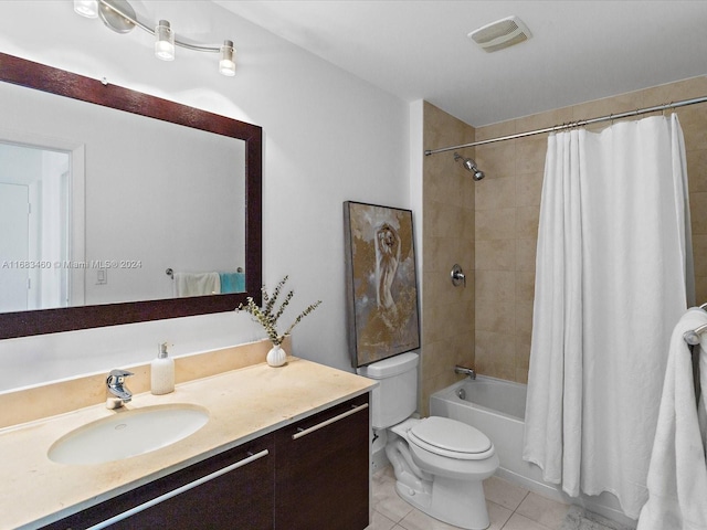 full bathroom with toilet, shower / tub combo, vanity, and tile patterned flooring