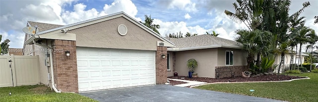 ranch-style home with a front lawn