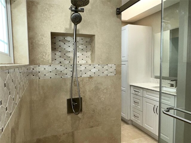 bathroom featuring vanity and tile patterned flooring