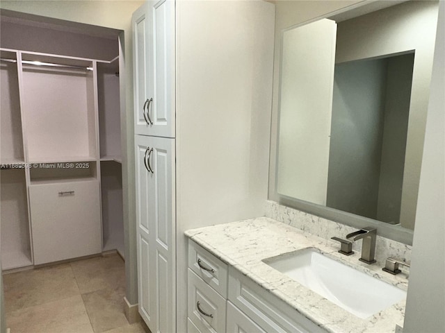 bathroom featuring vanity and tile patterned floors