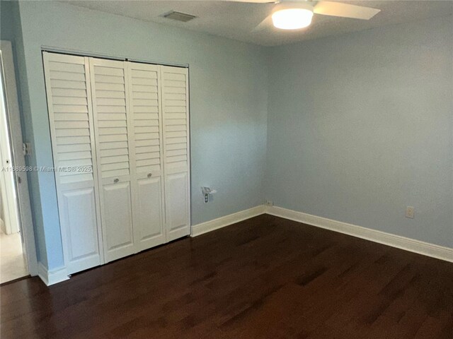 bedroom with hardwood / wood-style flooring and ceiling fan