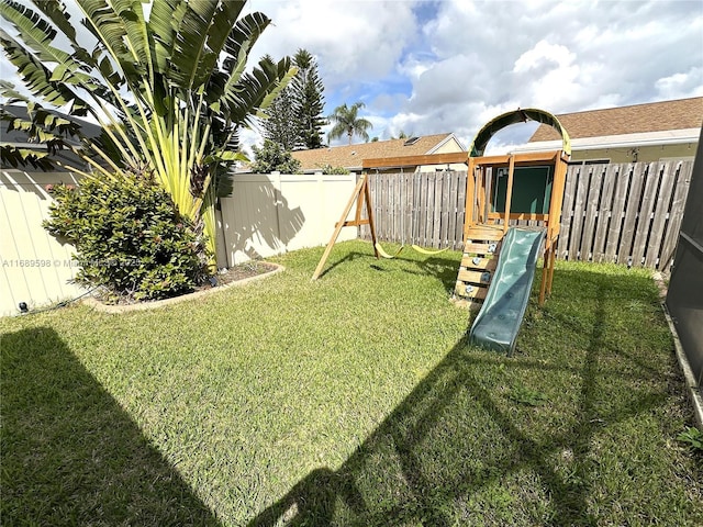 view of yard with a playground