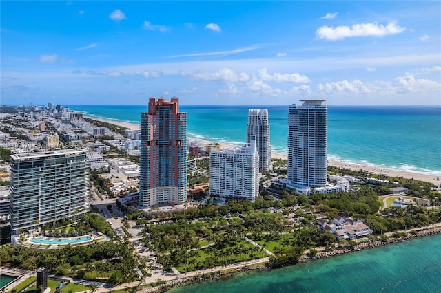 aerial view with a beach view and a water view