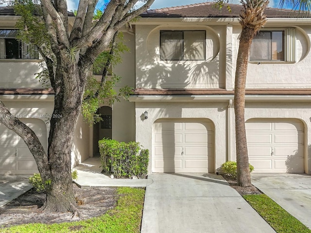 view of front of property with a garage