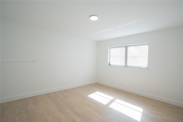 empty room featuring light hardwood / wood-style floors