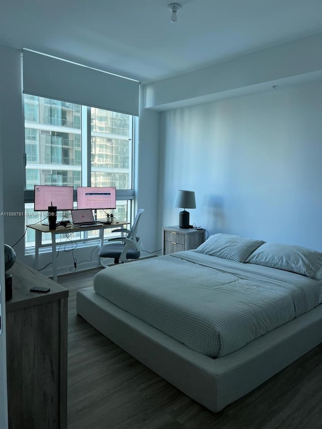 bedroom featuring wood-type flooring