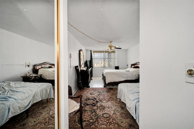 bedroom featuring a textured ceiling