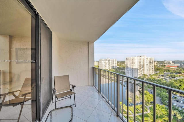 balcony featuring a water view