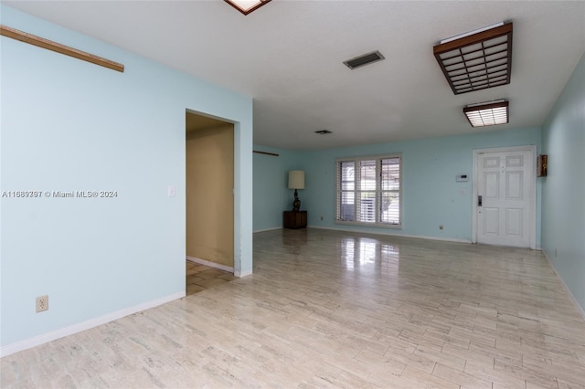 empty room featuring light hardwood / wood-style flooring