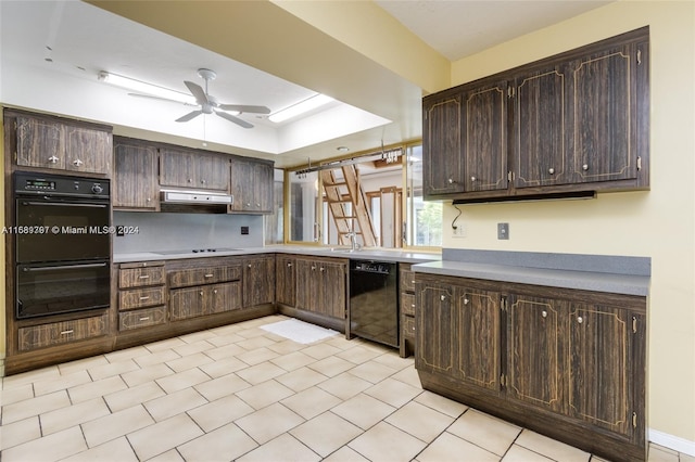 kitchen featuring ceiling fan, dark brown cabinets, black appliances, and range hood