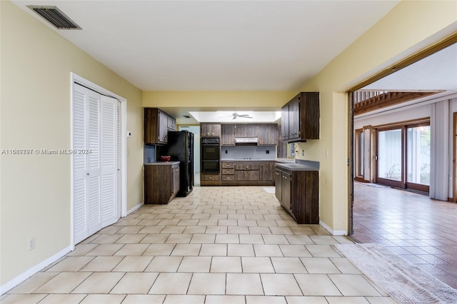 kitchen featuring dark brown cabinets and black appliances