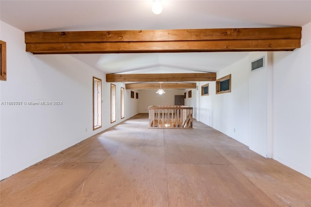 corridor featuring lofted ceiling with beams