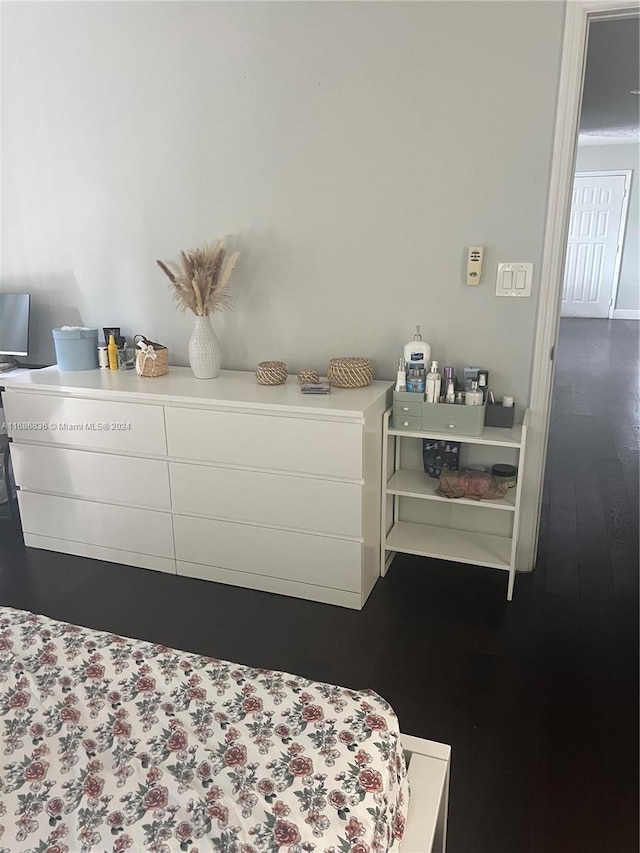 bedroom featuring dark hardwood / wood-style floors