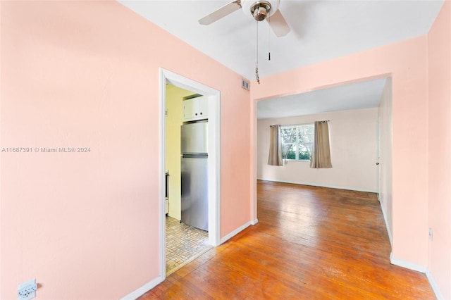 hallway featuring wood-type flooring