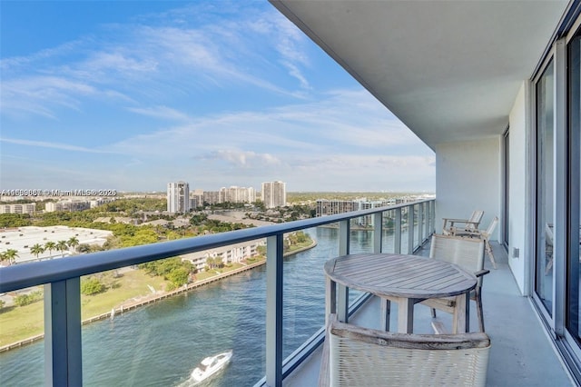 balcony featuring a water view