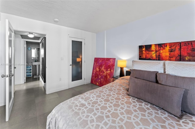 bedroom featuring a textured ceiling