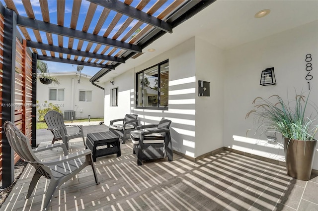 view of patio / terrace with a pergola, an outdoor living space, and cooling unit