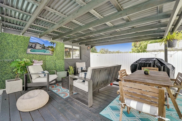 deck with an outdoor hangout area